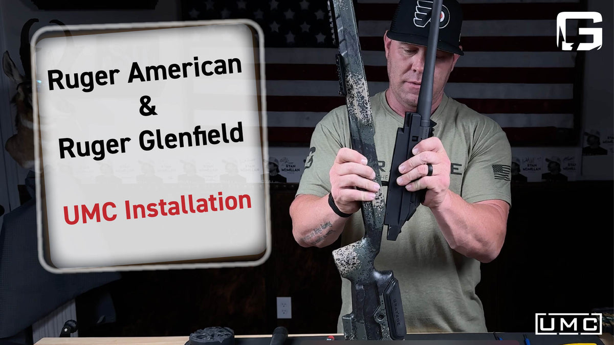a man installing rifle in stock